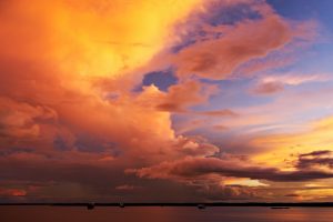 A majestic sunset over the Amazon river. 