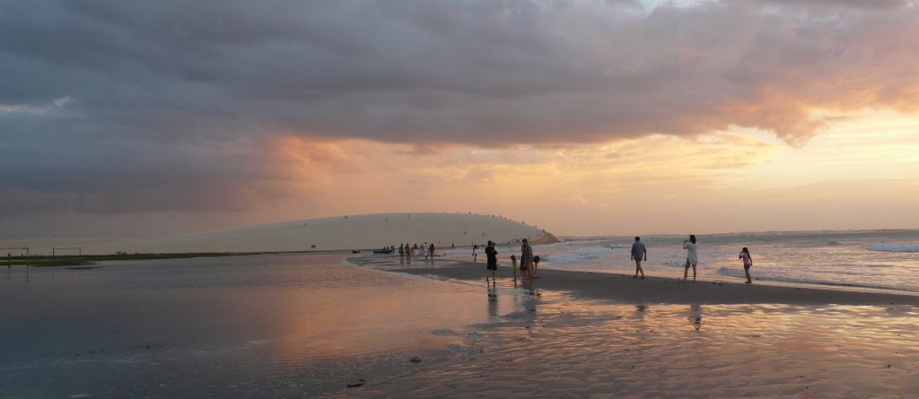 Sunset over a cloudy beach in Jericoacoara. 