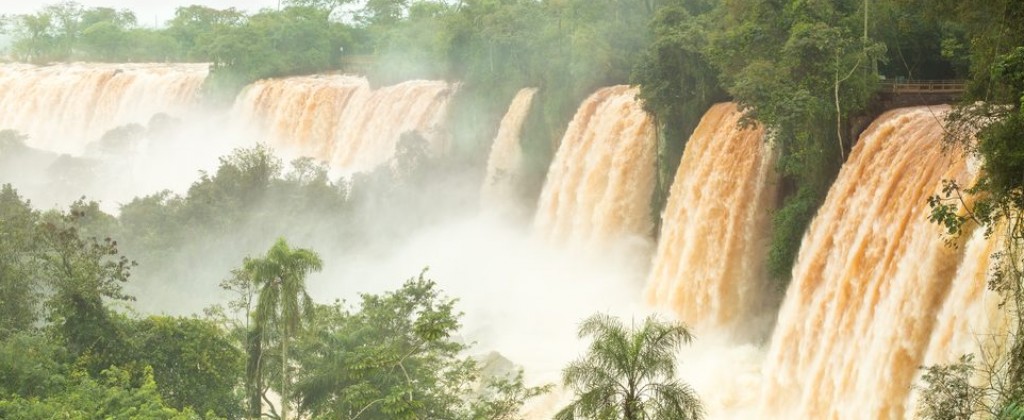 A shot from above of the cascading waters of Iguçu falls.