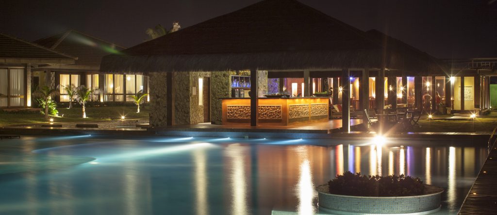 The pool at Zorah beach, lit by pleasant night lights. 