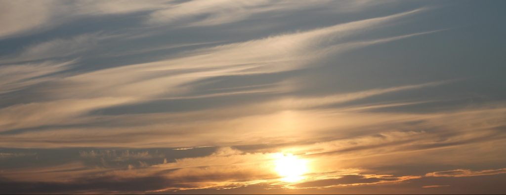 Sunset and whispy clouds in Brazil. 