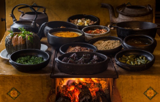 Different Afro - Brazilian dishes on display.