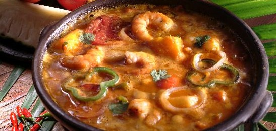African inspired dish in Brazil called moqueca de peixe com camarao.